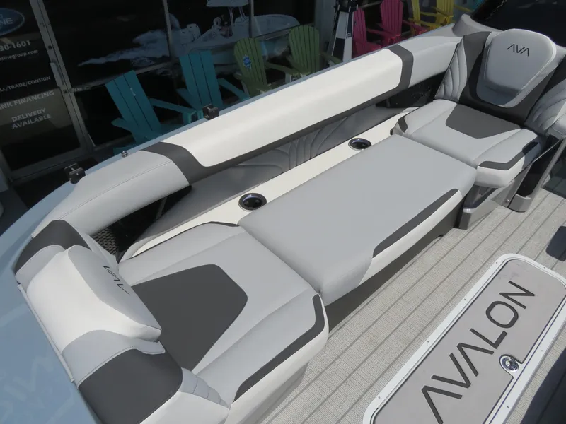 Slide: The Image of Luxurious seating on 2026 Avalon Excalibur Elite Windshield boat, featuring modern design and comfort. - 23