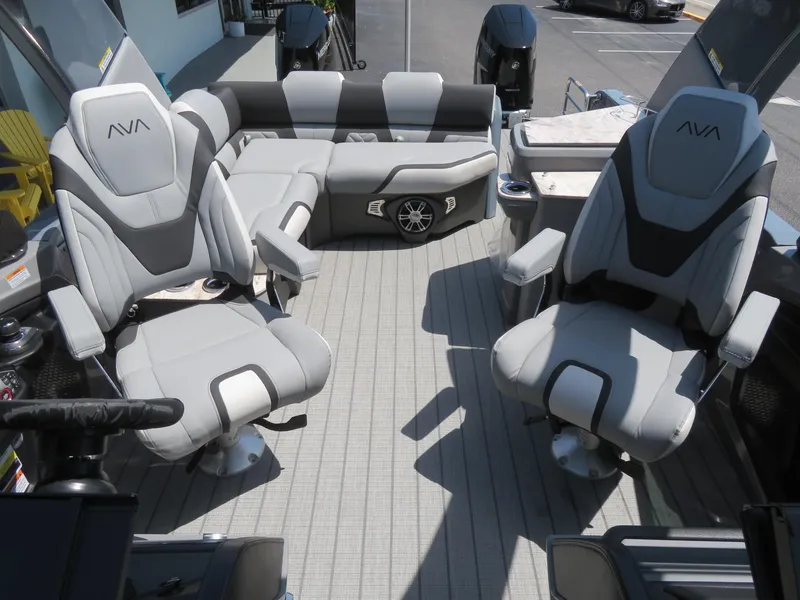 Slide: The Image of Luxurious seating on 2026 Avalon Excalibur Elite Windshield boat, featuring modern design and comfort. - 32