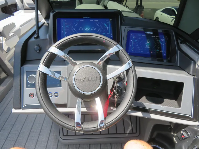 Slide: The Image of Steering wheel and dashboard of 2026 Avalon Excalibur Elite Windshield boat. - 43