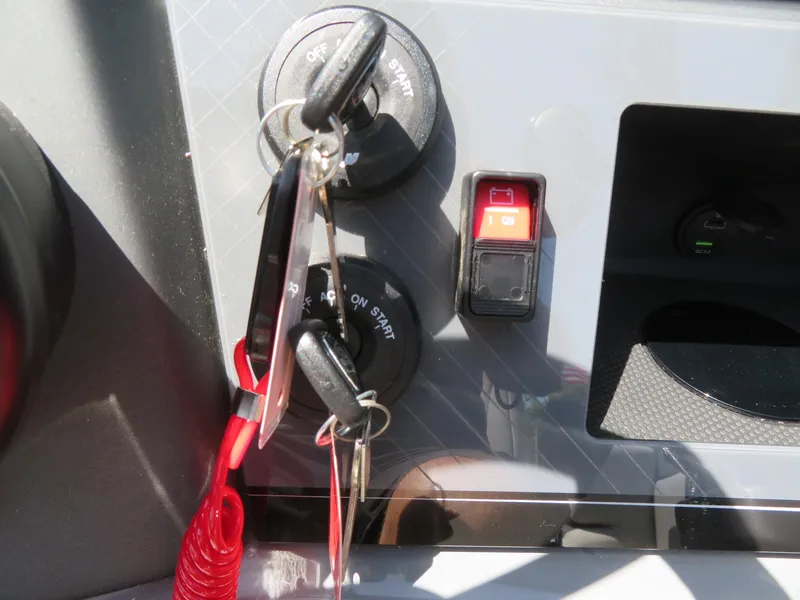 Slide: The Image of Control panel of 2026 Avalon Excalibur Elite Windshield with keys and ignition switch. - 45