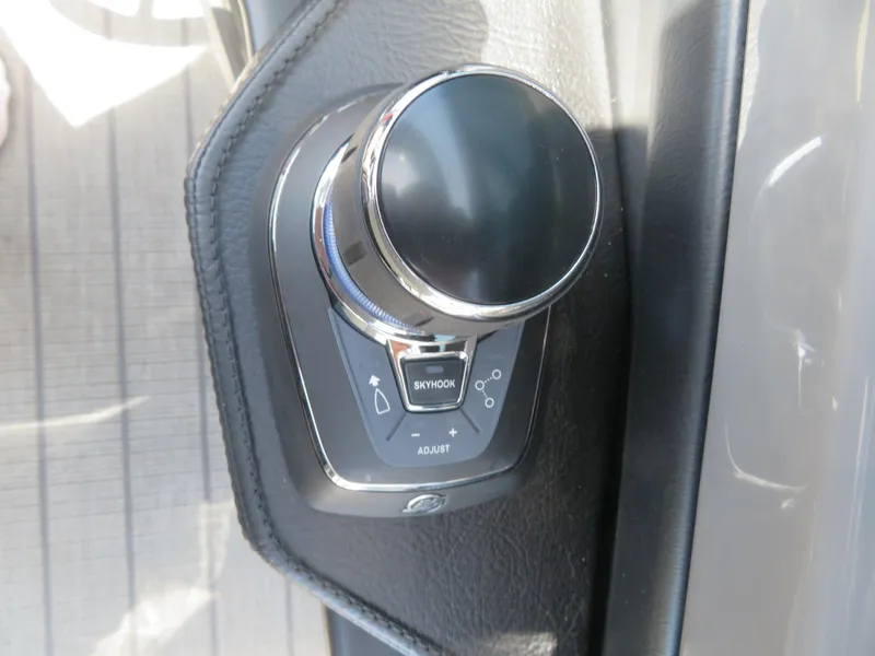 Slide: The Image of Control knob of 2026 Avalon Excalibur Elite Windshield, featuring adjustment and Skyhook buttons. - 48