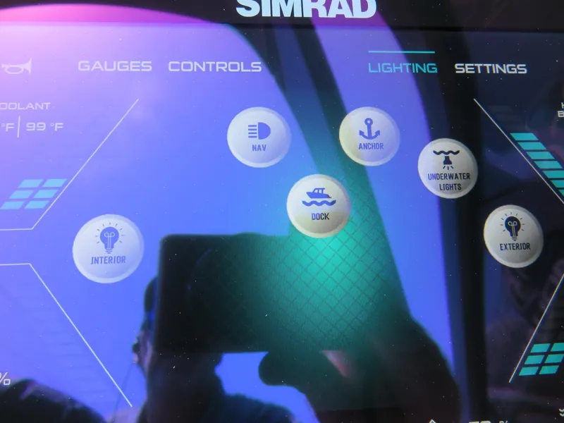 Slide: The Image of Touchscreen control panel on Avalon Excalibur boat, displaying navigation and lighting options. - 51