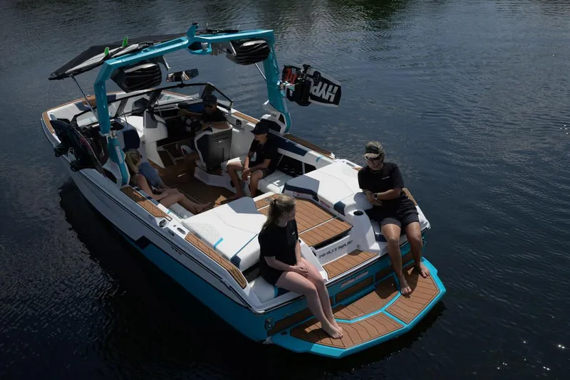 Slide: The Image of 2026 Nautique Super Air Nautique GS22 cockpit with modern steering and control panel. - 6