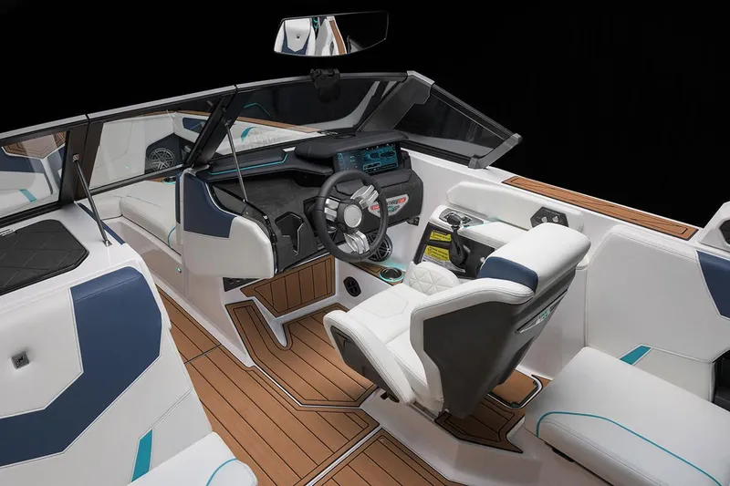 Slide: The Image of 2026 Nautique Super Air Nautique GS22 boat interior with luxurious seating and teak flooring. - 9