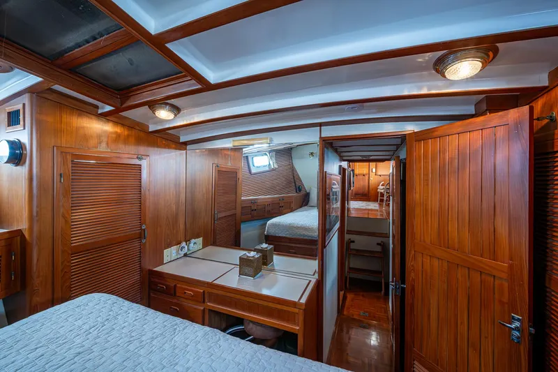 Slide: The Image of Interior of 1993 Kadey-Krogen Krogen 42 yacht with wooden paneling and cozy cabin. - 22