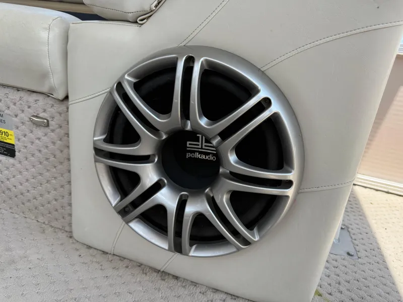 Slide: The Image of Polk Audio speaker on 2011 Tahoe Pontoon Double Decker boat interior. - 16