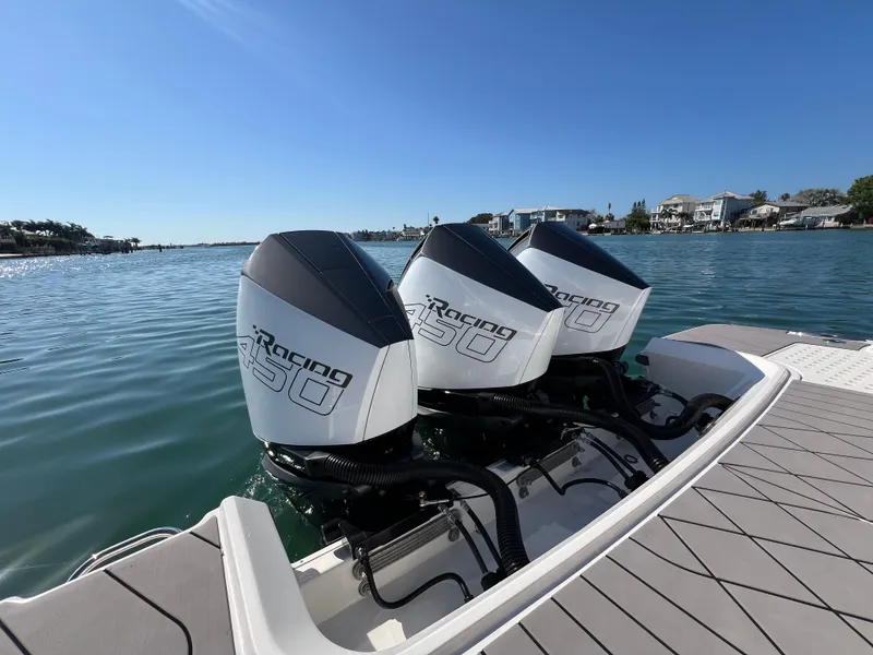 Slide: The Image of 2022 Sea Ray SLX 400 OB with triple Mercury Racing 450R outboard engines. - 4