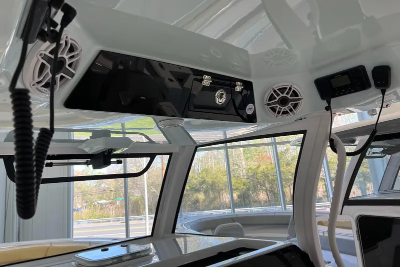 Slide: The Image of 2025 Sportsman Open 352 Center Console interior with speakers and control panel. - 4