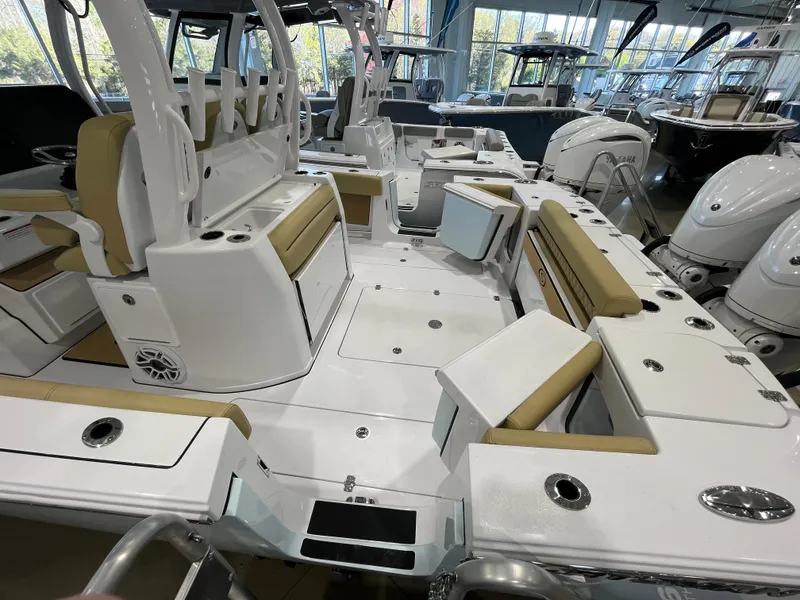 Slide: The Image of 2025 Sportsman Open 352 Center Console boat interior with seating and storage features. - 7