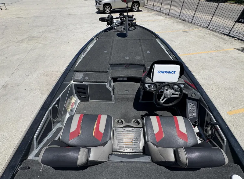 Slide: The Image of 2018 Skeeter FX 21 boat interior with Lowrance display and dual seats. - 3