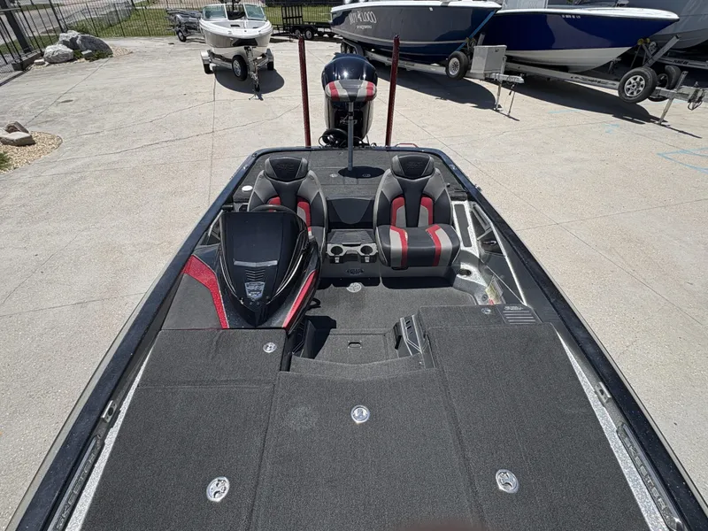 Slide: The Image of 2018 Skeeter FX 21 bass boat with dual seats and spacious deck. - 4