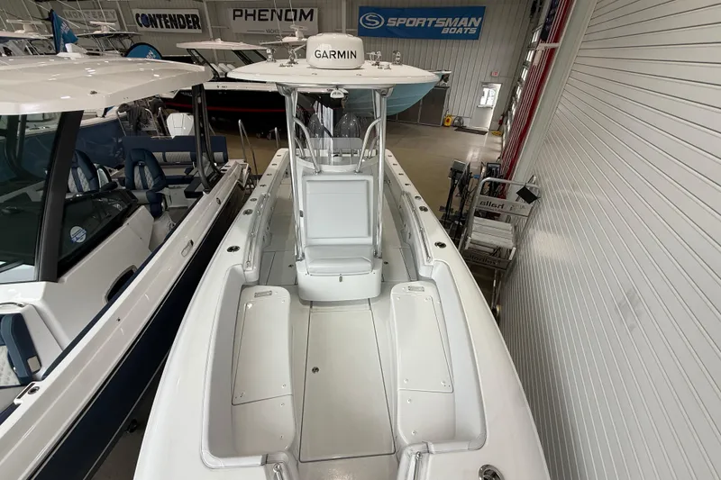 Slide: The Image of 2026 Contender 25 Tournament boat with Garmin equipment in showroom. - 15