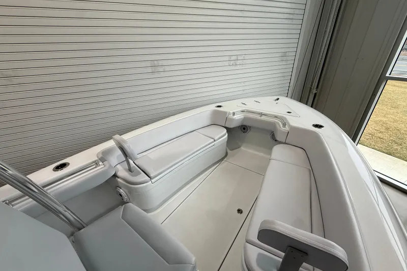 Slide: The Image of 2026 Contender 25 Tournament boat interior with sleek white seating and modern design. - 19