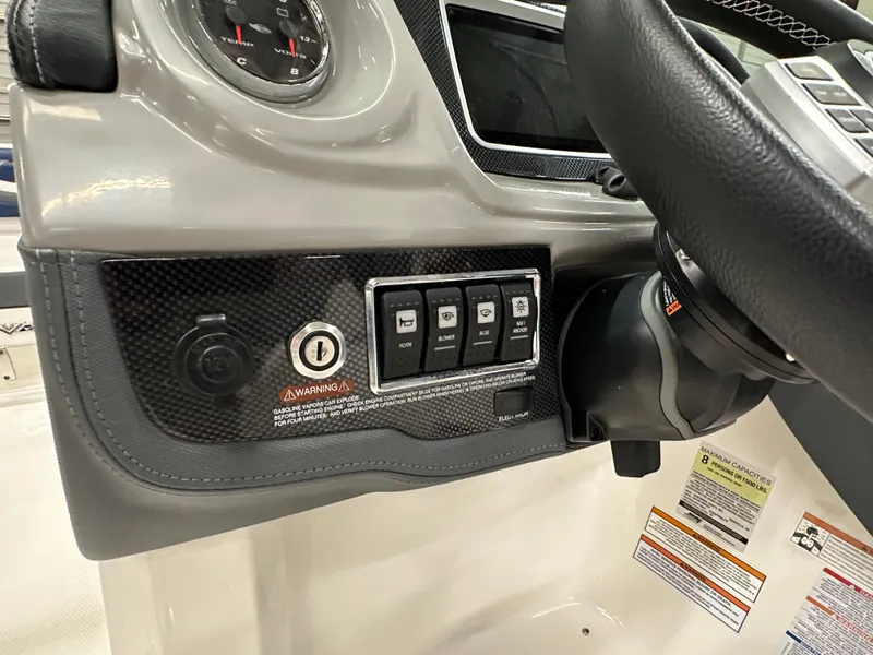 Slide: The Image of 2019 Chaparral Vortex 203 VR dashboard with steering wheel and control panel. - 45