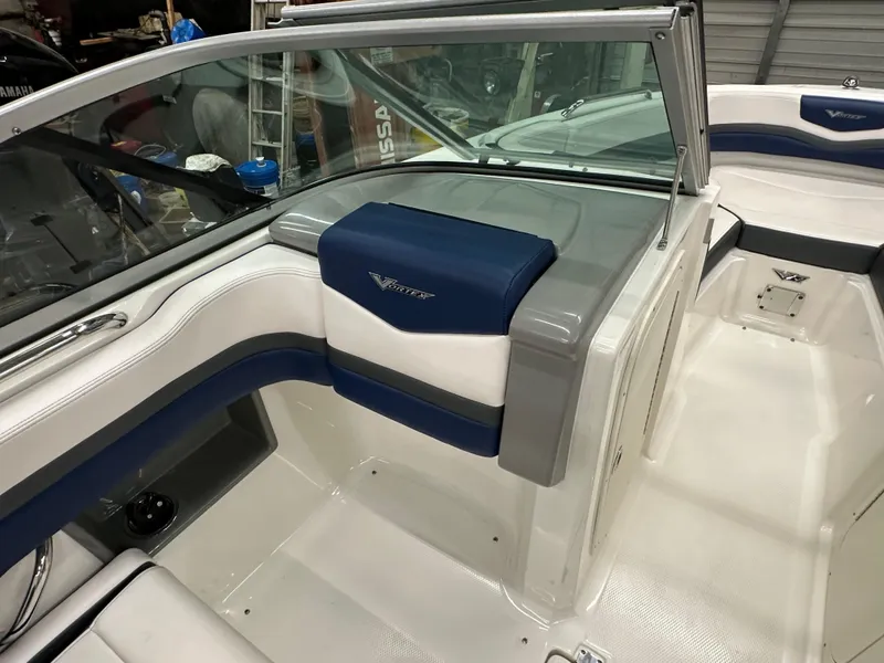 Slide: The Image of 2019 Chaparral Vortex 203 VR boat interior with blue and white seating. - 46