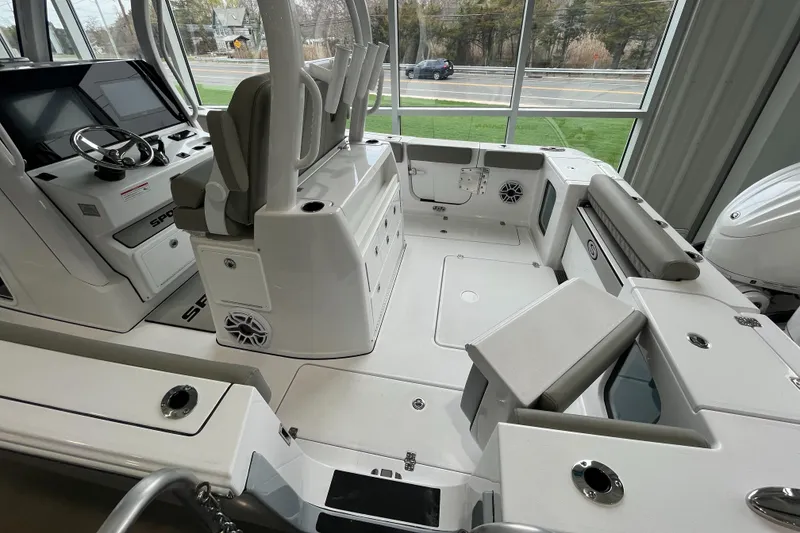 Slide: The Image of 2025 Sportsman Open 302 Center Console boat interior with seating and control panel. - 3