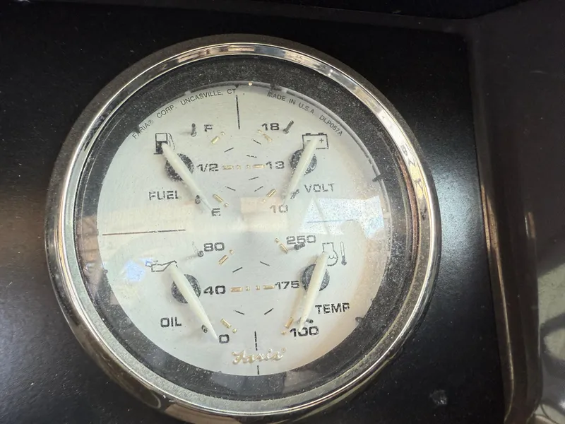 Slide: The Image of Close-up of a 2016 Monterey 196MS dashboard gauge displaying fuel, volt, oil, and temperature levels. - 13