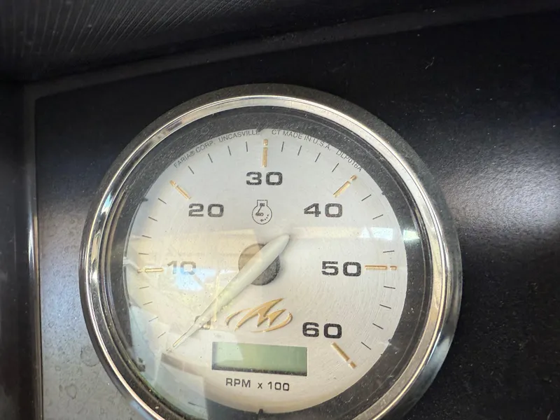 Slide: The Image of Close-up of a 2016 Monterey 196MS tachometer displaying RPM readings. - 15