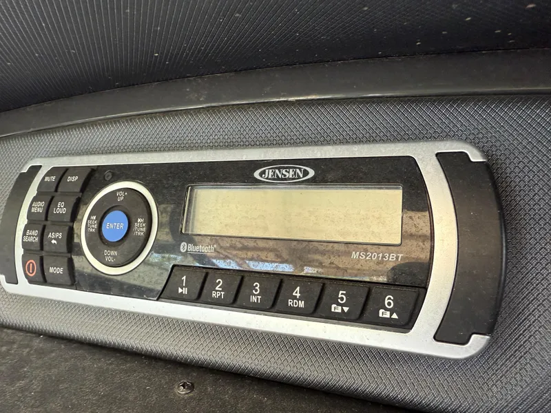Slide: The Image of Jensen MS2013BT stereo system in a 2016 Monterey 196MS boat dashboard. - 19