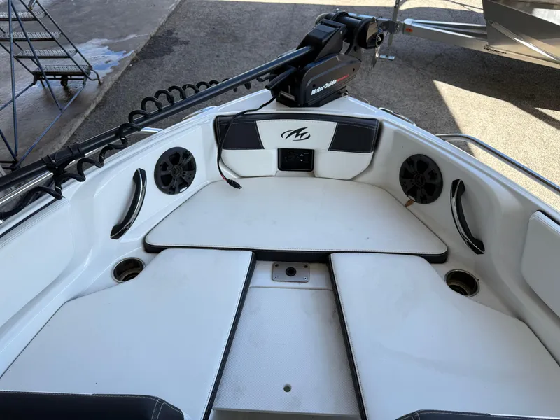 Slide: The Image of Interior of a 2016 Monterey 196MS boat with seating and speakers. - 20