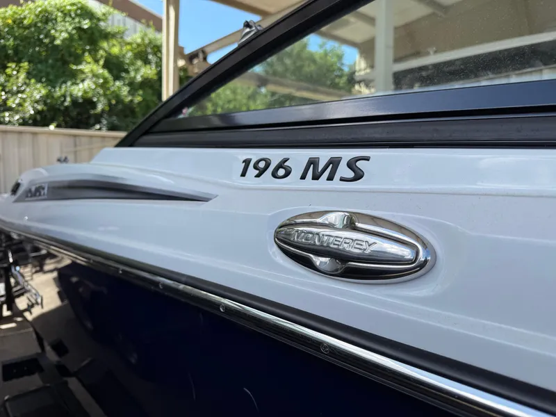 Slide: The Image of 2016 Monterey 196MS boat side view with logo and model name. - 5