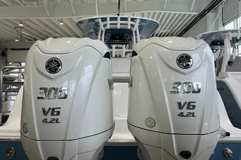 Slide: The Image of 2025 Sportsman Open 282 Center Console with twin Yamaha 300 V6 4.2L engines. - 1