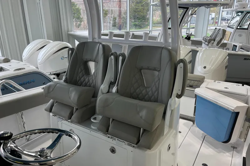 Slide: The Image of 2025 Sportsman Open 282 Center Console with dual seats and modern helm design. - 3