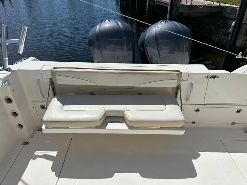 Slide: The Image of 2015 Wellcraft 290 Coastal boat with dual engines and foldable seating. - 6