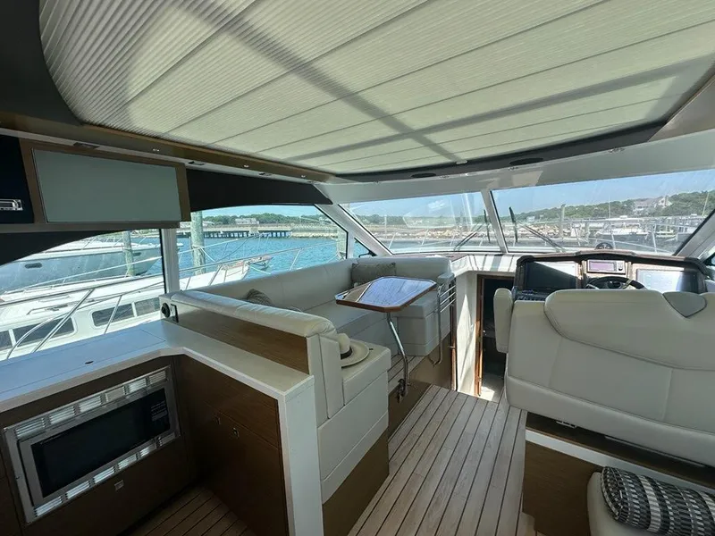 Slide: The Image of Luxurious interior of 2015 Cruisers Yachts 45 Cantius with modern amenities and scenic views. - 14