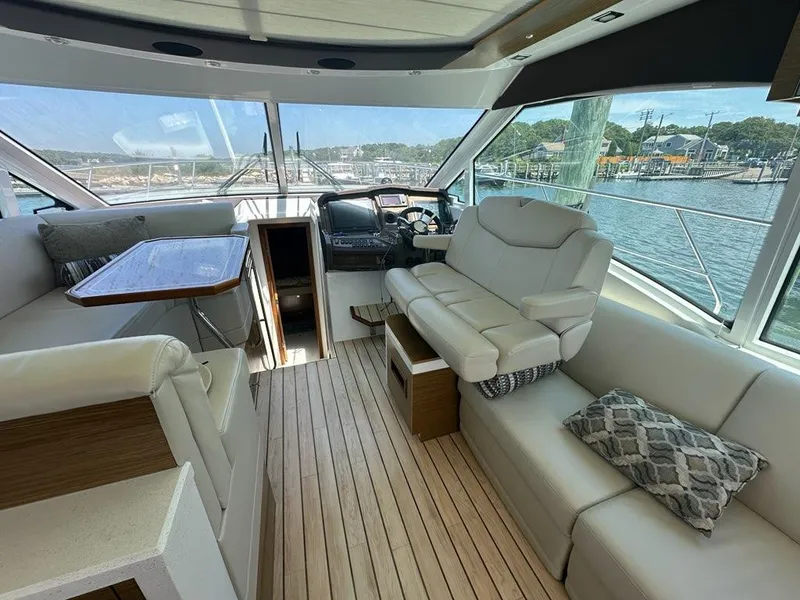 Slide: The Image of Luxurious interior of 2015 Cruisers Yachts 45 Cantius with plush seating and scenic views. - 16
