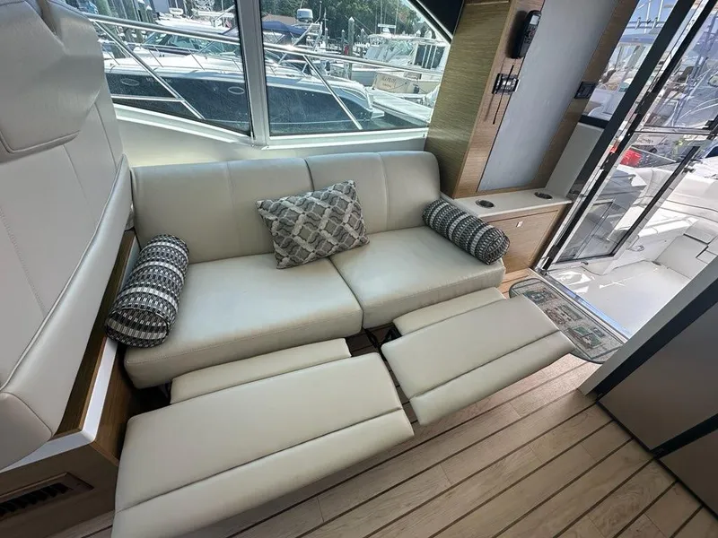 Slide: The Image of Luxurious interior of 2015 Cruisers Yachts 45 Cantius with plush seating and elegant decor. - 25