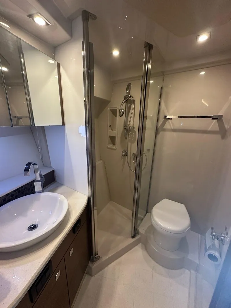 Slide: The Image of Luxurious bathroom in 2015 Cruisers Yachts 45 Cantius with modern fixtures and shower. - 41