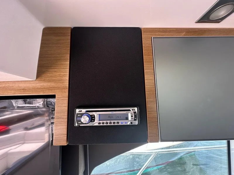 Slide: The Image of Interior of 2015 Cruisers Yachts 45 Cantius with audio system and modern design. - 34