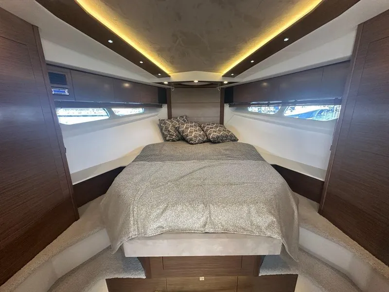 Slide: The Image of Luxurious bedroom interior of 2015 Cruisers Yachts 45 Cantius with modern design and ambient lighting. - 36
