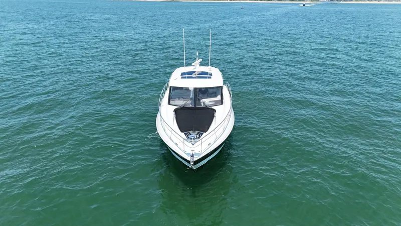 Slide: The Image of 2015 Cruisers Yachts 45 Cantius on open water, aerial view. - 9