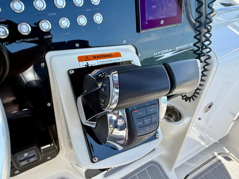 Slide: The Image of 2006 Hydra-Sports Vector VX boat control panel with throttle and warning label. - 17