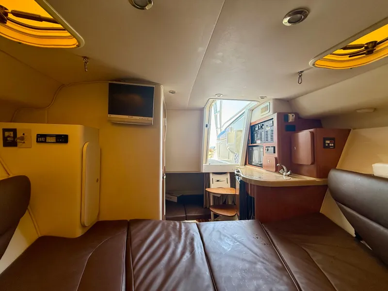 Slide: The Image of Interior of 2006 Hydra-Sports Vector VX boat with cozy seating and modern amenities. - 38