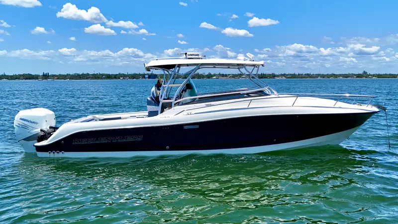 Slide: The Image of 2006 Hydra-Sports Vector VX boat on clear blue water under a sunny sky. - 7