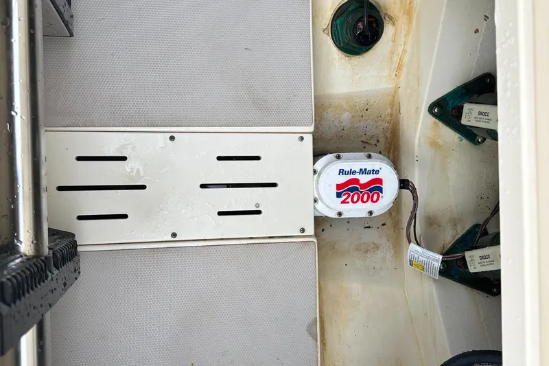 Slide: The Image of 2012 Scout 275 XSF boat interior with Rule-Mate 2000 bilge pump. - 13