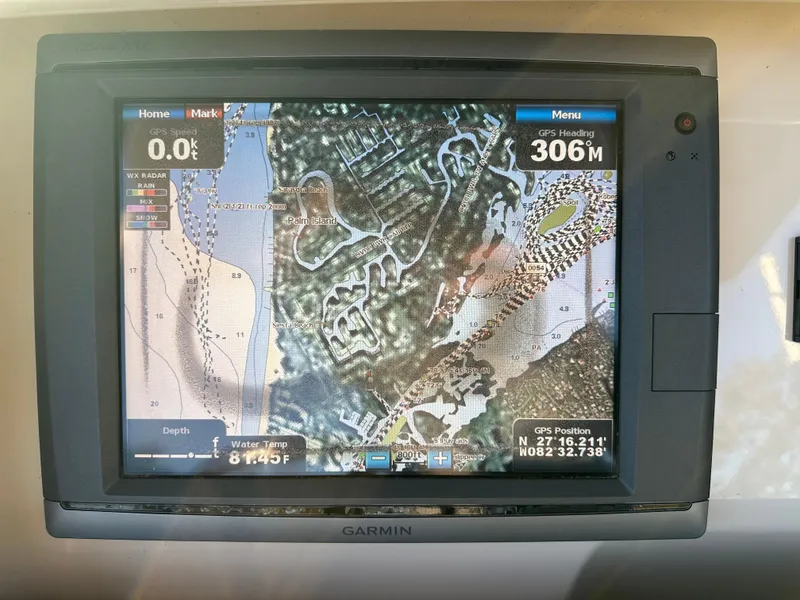 Slide: The Image of Garmin GPS display on 2012 Scout 275 XSF boat showing navigation map. - 6