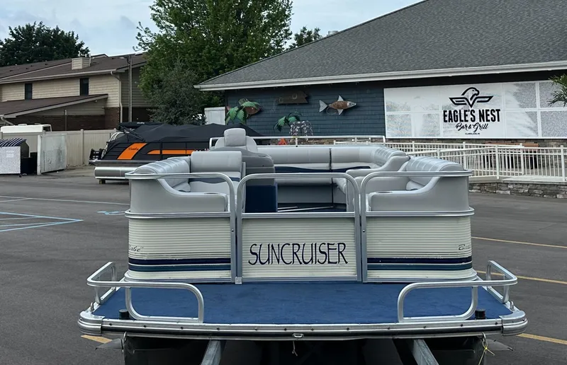 Slide: The Image of 1997 Suncruiser 22 pontoon boat parked near Eagle's Nest Bar & Grill. - 4