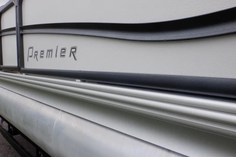 Slide: The Image of 2019 Premier 220 SunSation pontoon boat, close-up of side panel and logo. - 19