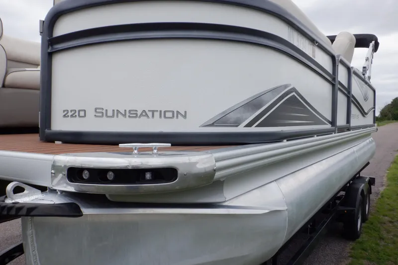 Slide: The Image of 2019 Premier 220 SunSation pontoon boat on trailer, side view. - 21
