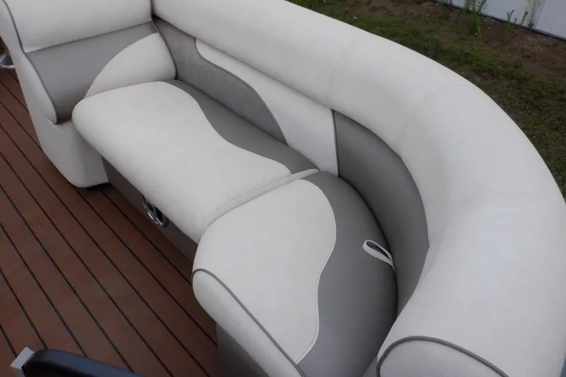 Slide: The Image of Luxurious seating on 2019 Premier 220 SunSation boat with elegant beige and gray upholstery. - 22