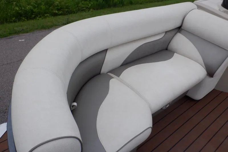 Slide: The Image of 2019 Premier 220 SunSation boat seating with elegant gray and white upholstery. - 23