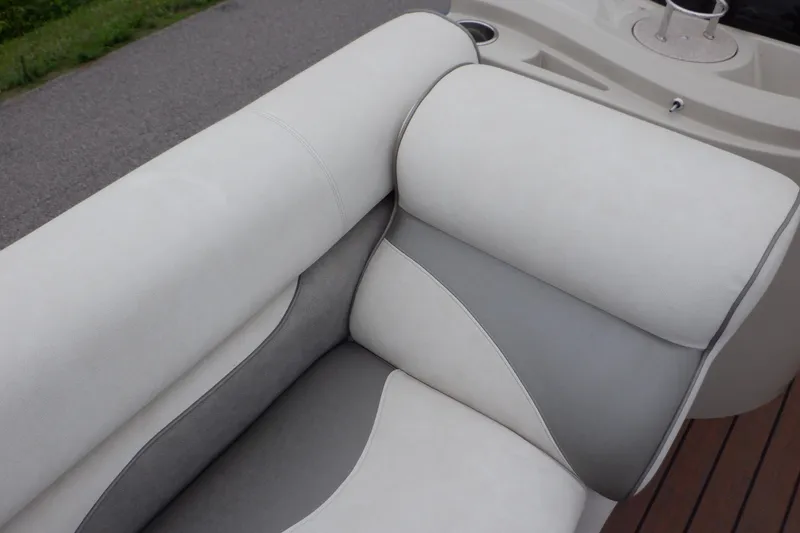 Slide: The Image of Premier 220 SunSation 2019 boat seat with gray and white upholstery. - 24