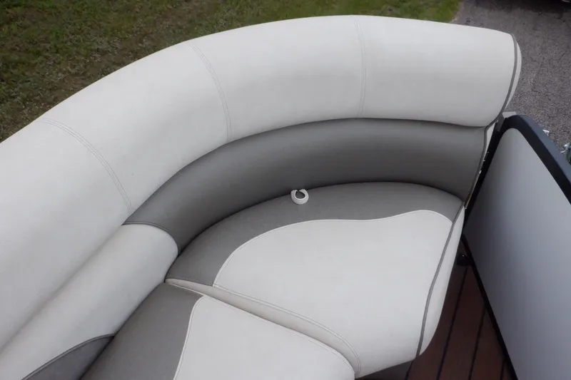 Slide: The Image of 2019 Premier 220 SunSation boat seating with gray and white upholstery. - 26