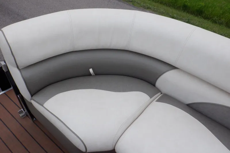 Slide: The Image of 2019 Premier 220 SunSation boat seating with white and gray upholstery. - 27