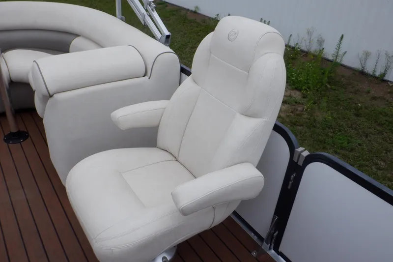 Slide: The Image of Luxurious seating on 2019 Premier 220 SunSation boat with plush white upholstery. - 29