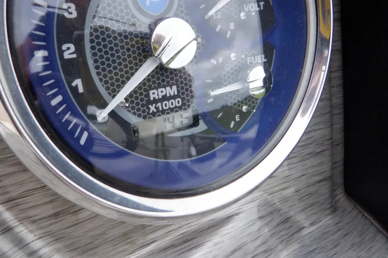 Slide: The Image of Close-up of 2019 Premier 220 SunSation RPM gauge with chrome trim. - 33